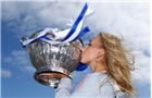EASTBOURNE, ENGLAND - JUNE 22:  Elena Vesnina of Russia poses with the women's singles trophy after defeating Jamie Hampton of the USA on day eight of the AEGON International tennis tournament at Devonshire Park on June 22, 2013 in Eastbourne, England.  (Photo by Jan Kruger/Getty Images)